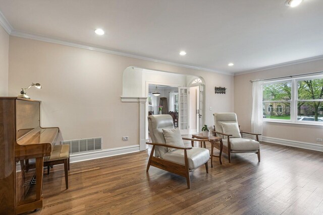 230 N Wisner St, Park Ridge, IL 60068 - sitting room featuring wood finished floors, crown molding, arched walkways, baseboards, and recessed lighting
