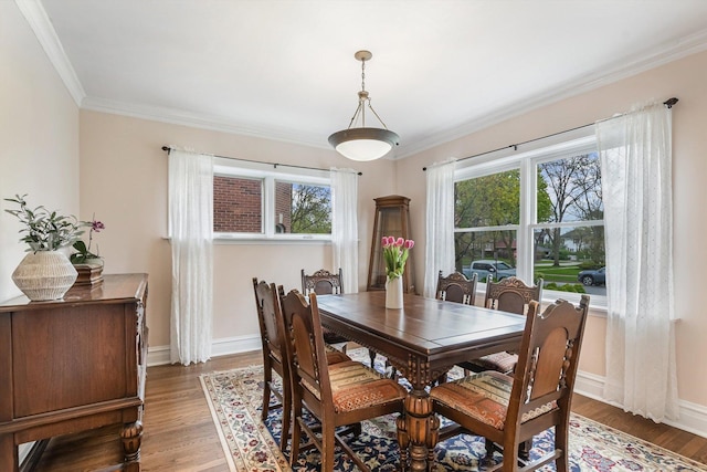 230 N Wisner St, Park Ridge, IL 60068 - dining room featuring ornamental molding, light wood-style flooring, and baseboards