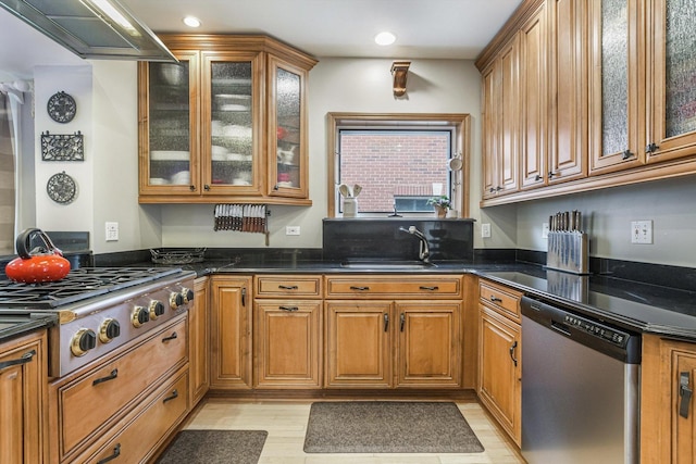 230 N Wisner St, Park Ridge, IL 60068 - kitchen featuring appliances with stainless steel finishes, brown cabinets, a sink, recessed lighting, and glass insert cabinets