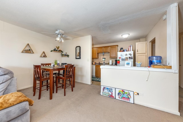 2222 S Stewart Ave Unit 4K, Lombard, IL 60148 - dining room featuring light carpet, a ceiling fan, and baseboards