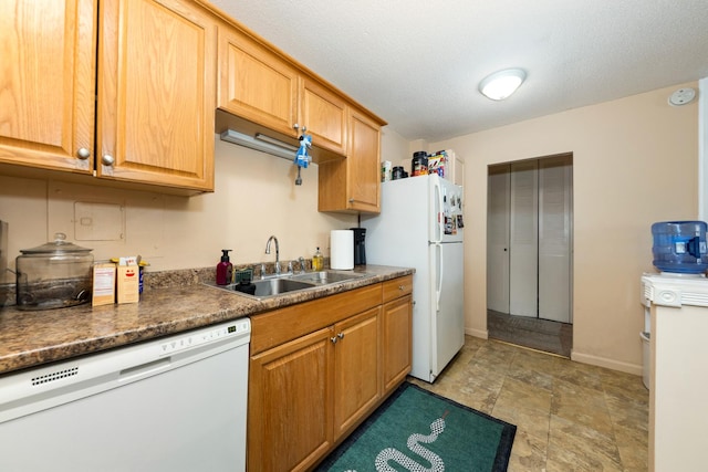 2222 S Stewart Ave Unit 4K, Lombard, IL 60148 - kitchen with white appliances, a sink, and baseboards