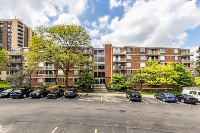2222 S Stewart Ave Unit 4K, Lombard, IL 60148 - view of apartment building / complex featuring uncovered parking
