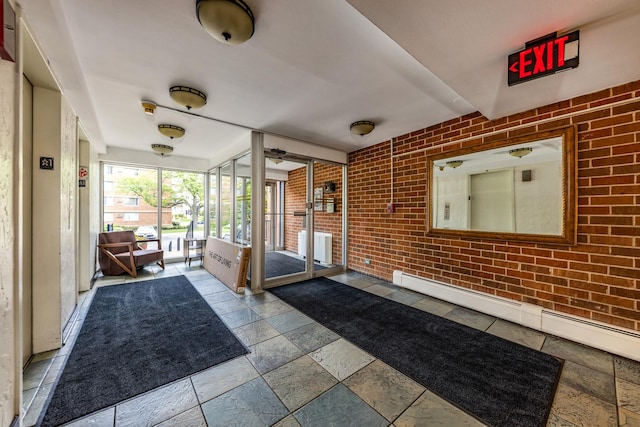 2222 S Stewart Ave Unit 4K, Lombard, IL 60148 - sunroom / solarium with a baseboard radiator