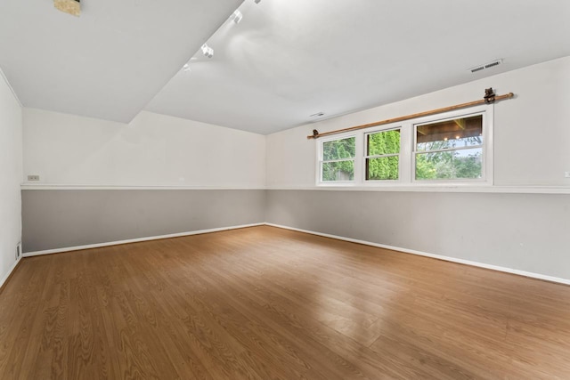 169 S Ellyn Ave, Glen Ellyn, IL 60137 - spare room with wood finished floors and baseboards