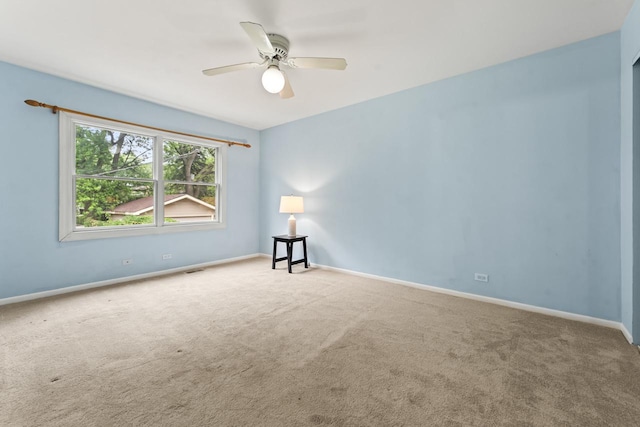 169 S Ellyn Ave, Glen Ellyn, IL 60137 - carpeted spare room featuring baseboards and ceiling fan
