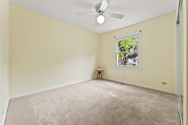 169 S Ellyn Ave, Glen Ellyn, IL 60137 - carpeted empty room featuring baseboards and ceiling fan