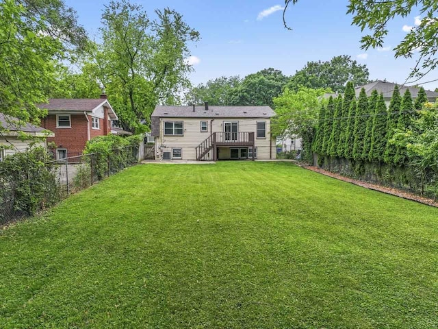 169 S Ellyn Ave, Glen Ellyn, IL 60137 - rear view of house with a fenced backyard, a deck, and stairs