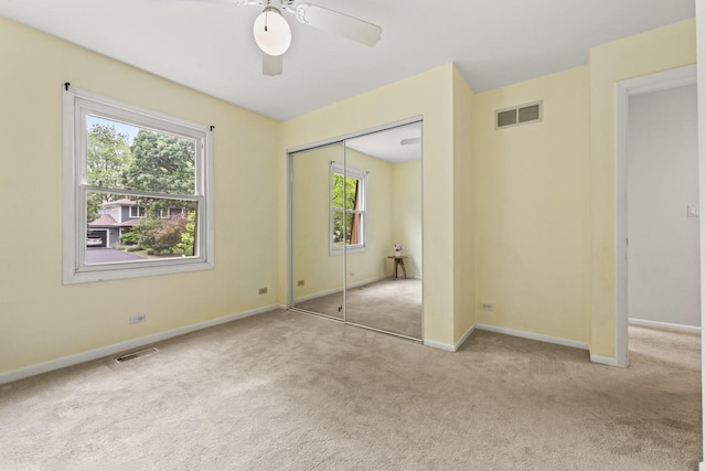 169 S Ellyn Ave, Glen Ellyn, IL 60137 - unfurnished bedroom with carpet, a closet, and ceiling fan