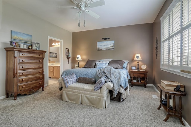 608 Bridgeman Ln, Romeoville, IL 60446 - bedroom featuring light colored carpet, multiple windows, baseboards, and ensuite bath