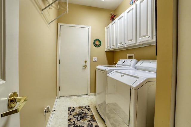 608 Bridgeman Ln, Romeoville, IL 60446 - laundry room featuring washing machine and clothes dryer, cabinet space, and baseboards