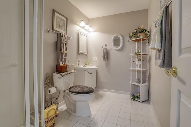608 Bridgeman Ln, Romeoville, IL 60446 - bathroom with vanity, tile patterned flooring, baseboards, and toilet