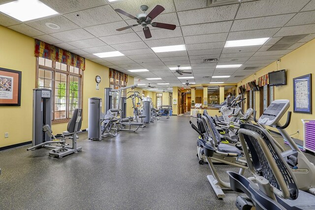 608 Bridgeman Ln, Romeoville, IL 60446 - gym featuring a drop ceiling, a ceiling fan, and baseboards