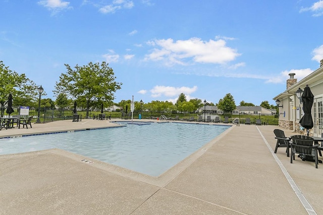 608 Bridgeman Ln, Romeoville, IL 60446 - community pool featuring a patio area