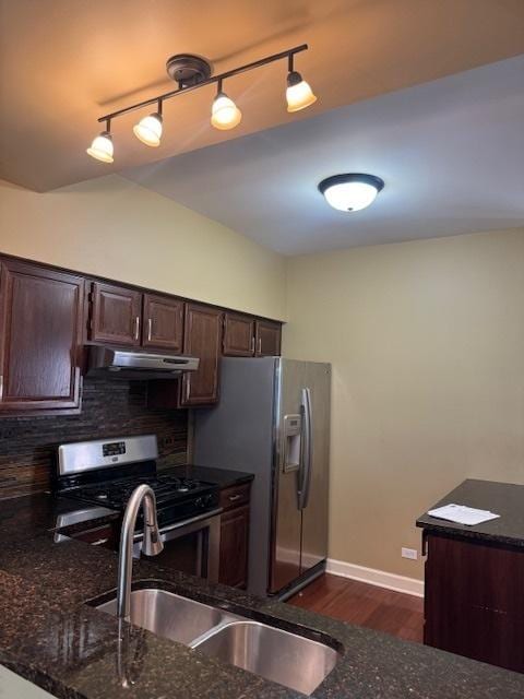 308 Glen Leven Ct Unit 308, Schaumburg, IL 60194 - kitchen featuring under cabinet range hood, stainless steel appliances, dark brown cabinets, and dark stone countertops