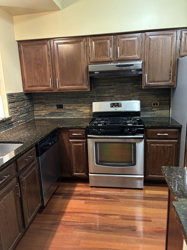 308 Glen Leven Ct Unit 308, Schaumburg, IL 60194 - kitchen with stainless steel appliances, range hood, backsplash, dark brown cabinetry, and dark wood-style floors