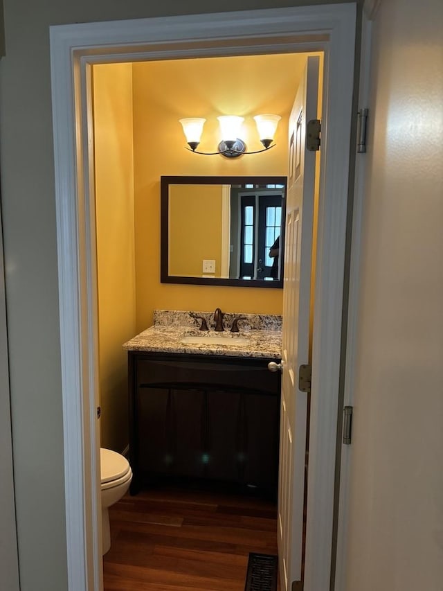 308 Glen Leven Ct Unit 308, Schaumburg, IL 60194 - half bathroom with wood finished floors, vanity, and toilet
