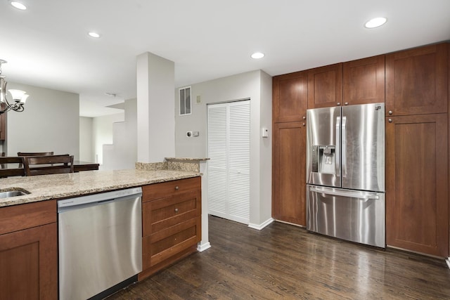 2720 N Greenview Ave Unit C, Chicago, IL 60614 - kitchen featuring appliances with stainless steel finishes, dark wood finished floors, light stone countertops, baseboards, and recessed lighting