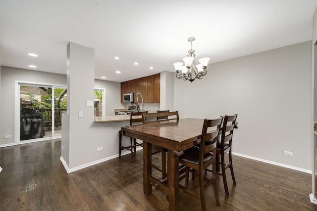 2720 N Greenview Ave Unit C, Chicago, IL 60614 - dining room with baseboards, dark wood-style floors, recessed lighting, and a chandelier