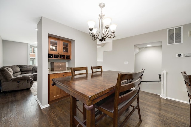 2720 N Greenview Ave Unit C, Chicago, IL 60614 - dining space with dark wood-style flooring, a chandelier, baseboards, and recessed lighting