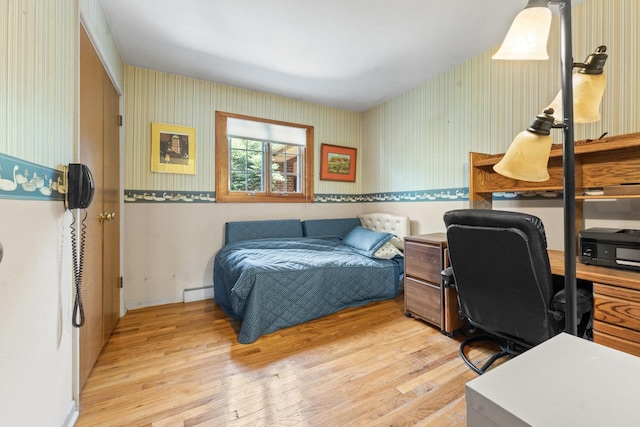 137 N Clark Dr, Palatine, IL 60074 - bedroom with wallpapered walls, light wood-style flooring, and an office area