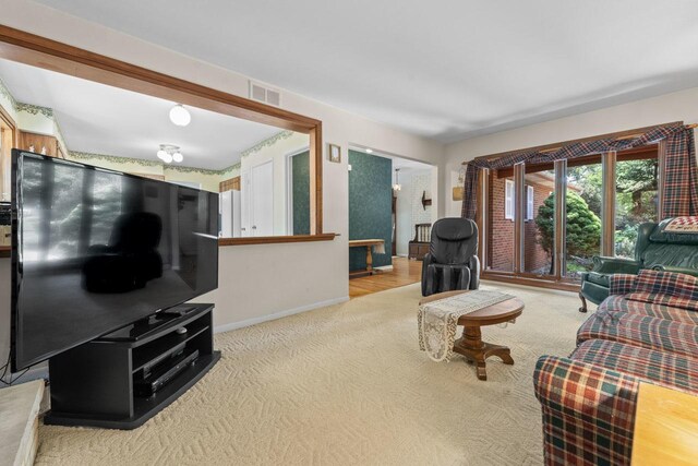 137 N Clark Dr, Palatine, IL 60074 - carpeted living area with baseboards