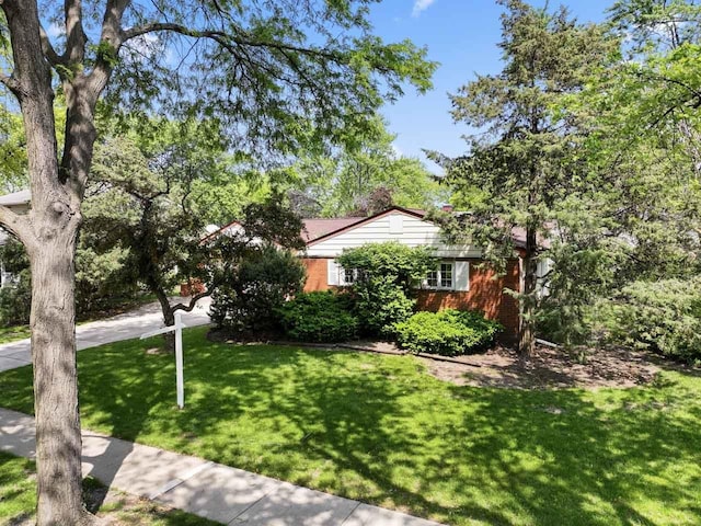 137 N Clark Dr, Palatine, IL 60074 - view of front of property featuring a front yard and brick siding