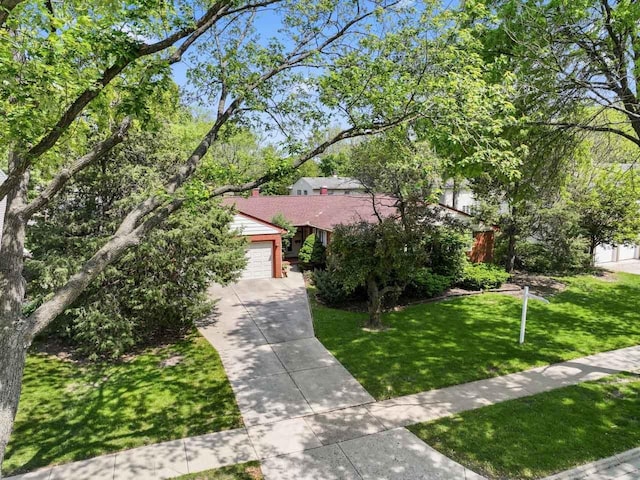 137 N Clark Dr, Palatine, IL 60074 - obstructed view of property featuring a front yard and driveway