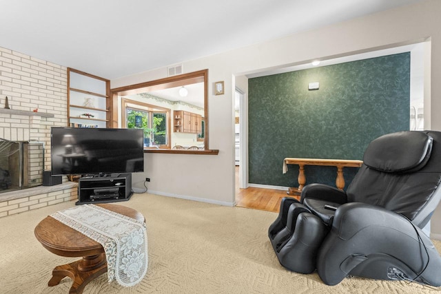 137 N Clark Dr, Palatine, IL 60074 - living area featuring carpet flooring, baseboards, a brick fireplace, and built in shelves