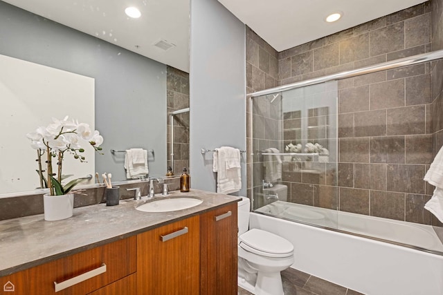 240 E Illinois St Unit 805, Chicago, IL 60611 - full bathroom featuring vanity, toilet, bath / shower combo with glass door, and recessed lighting