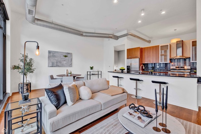 240 E Illinois St Unit 805, Chicago, IL 60611 - living room with light wood-style flooring and recessed lighting