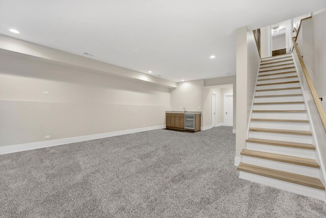 2353 W Ohio St, Chicago, IL 60612 - finished below grade area with wet bar, carpet flooring, stairway, baseboards, and recessed lighting