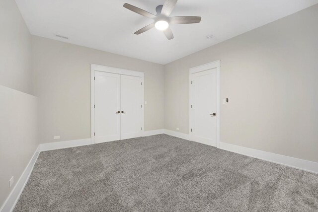 2353 W Ohio St, Chicago, IL 60612 - unfurnished bedroom with baseboards, carpet floors, a ceiling fan, and a closet