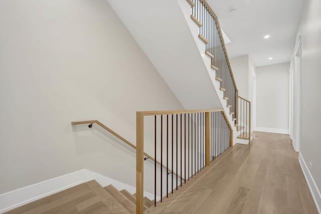 2353 W Ohio St, Chicago, IL 60612 - stairway with wood finished floors, baseboards, and recessed lighting