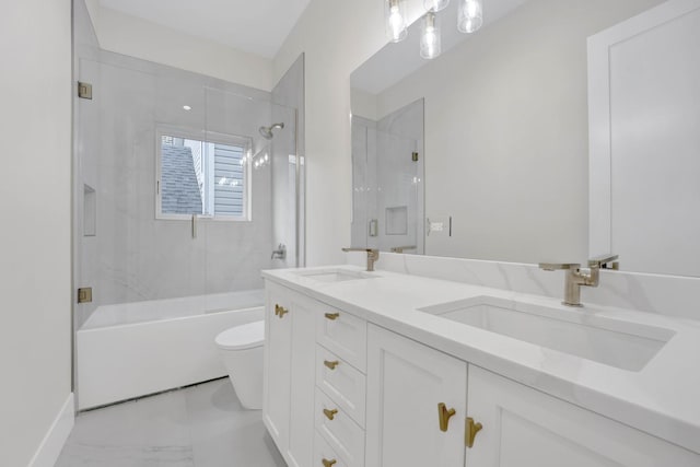 2353 W Ohio St, Chicago, IL 60612 - full bath featuring toilet, double vanity, shower / bath combination with glass door, and marble finish flooring