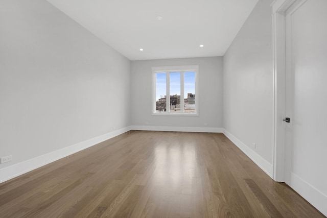 2353 W Ohio St, Chicago, IL 60612 - spare room with wood finished floors, baseboards, and recessed lighting
