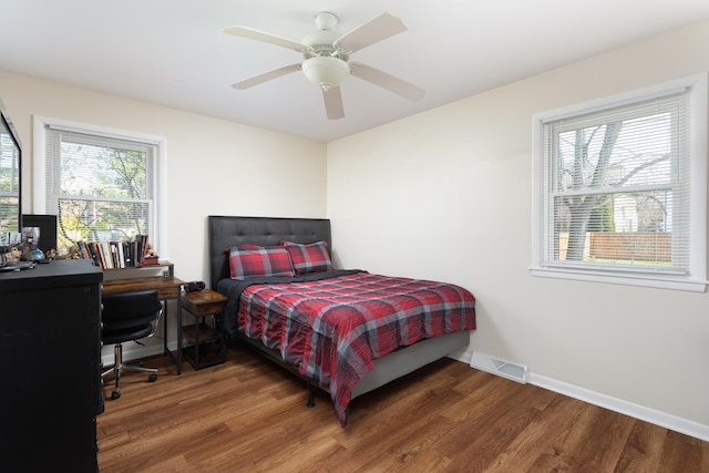 206-208 N Fremont St, Naperville, IL 60540 - bedroom with wood finished floors, baseboards, a desk, and a ceiling fan