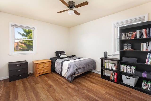 206-208 N Fremont St, Naperville, IL 60540 - bedroom with wood finished floors, baseboards, and ceiling fan