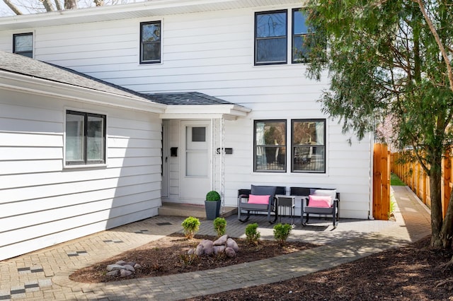 206-208 N Fremont St, Naperville, IL 60540 - rear view of house featuring a shingled roof, a patio, and outdoor lounge area
