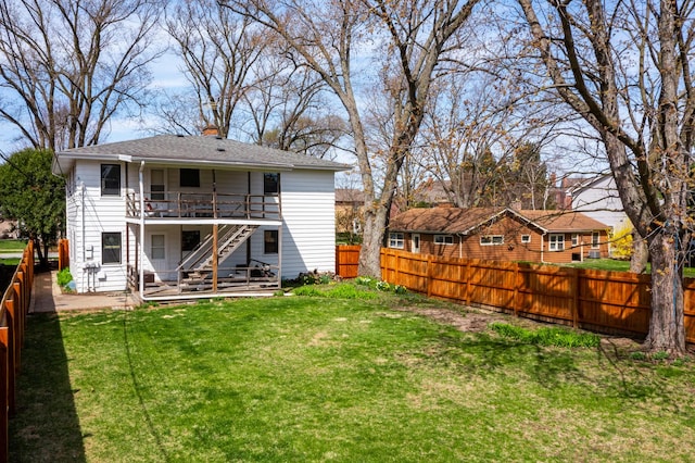 206-208 N Fremont St, Naperville, IL 60540 - rear view of house featuring stairs, a chimney, a deck, and a patio