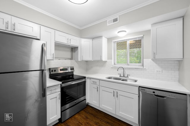 6724 181st St Unit 1513, Tinley Park, IL 60477 - kitchen featuring stainless steel appliances, a sink, ornamental molding, light countertops, and white cabinetry