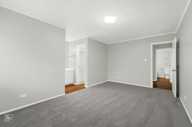 6724 181st St Unit 1513, Tinley Park, IL 60477 - unfurnished bedroom with dark colored carpet, crown molding, baseboards, and ensuite bathroom