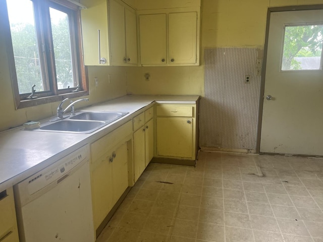 601 15th Ave, Sterling, IL 61081 - kitchen with dishwasher, a sink, healthy amount of natural light, and light countertops