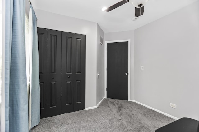 1475 Beaumont Cir, Bartlett, IL 60103 - unfurnished bedroom with carpet floors, baseboards, a closet, and a ceiling fan