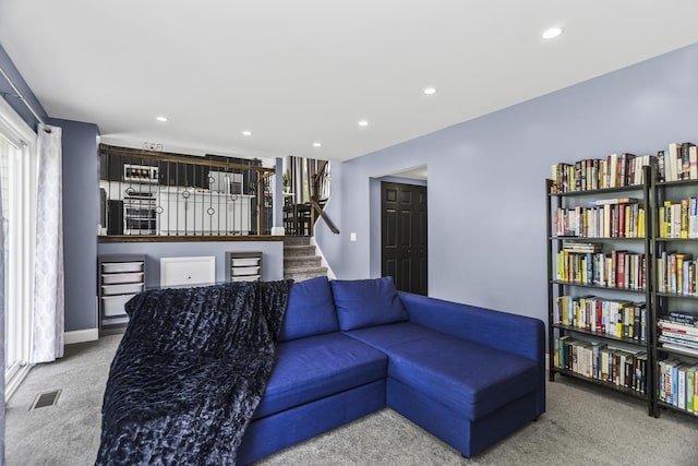 1475 Beaumont Cir, Bartlett, IL 60103 - carpeted living area with stairway and recessed lighting