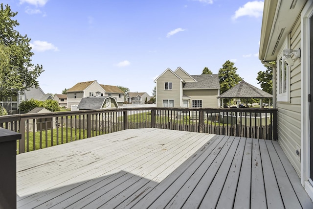 1475 Beaumont Cir, Bartlett, IL 60103 - wooden terrace featuring a gazebo, a residential view, a lawn, and a shed