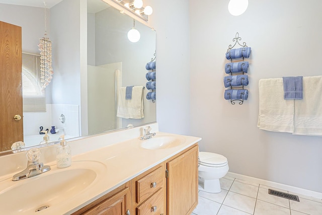 15 Brittany Ct, South Elgin, IL 60177 - bathroom with tile patterned flooring, double vanity, toilet, a garden tub, and an enclosed shower