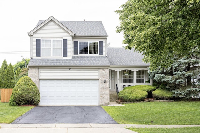 15 Brittany Ct, South Elgin, IL 60177 - traditional home featuring driveway, brick siding, a shingled roof, and an attached garage