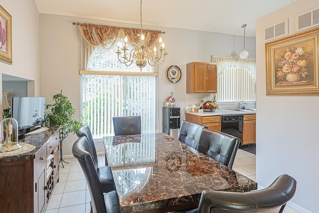 15 Brittany Ct, South Elgin, IL 60177 - dining space featuring light tile patterned floors and a chandelier