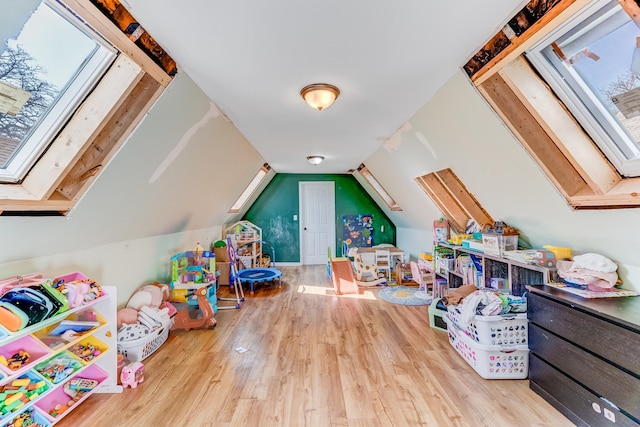 2248 W 50th Pl, Chicago, IL 60609 - recreation room featuring wood finished floors and vaulted ceiling