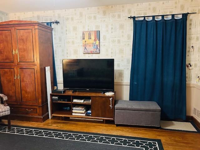 1607 183rd St, Homewood, IL 60430 - living room with wallpapered walls and wood finished floors